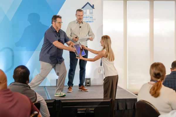 Builder Marketing Summit attendee winning a prize