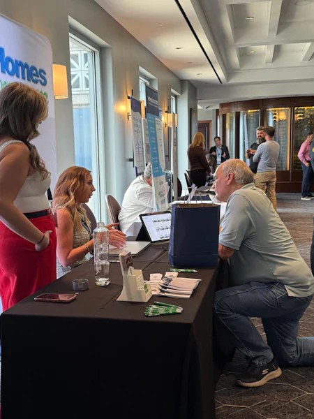 Builder Marketing Summit attendee meeting with sponsors