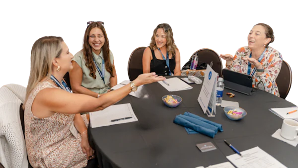 Builder Marketing Summit attendees at table