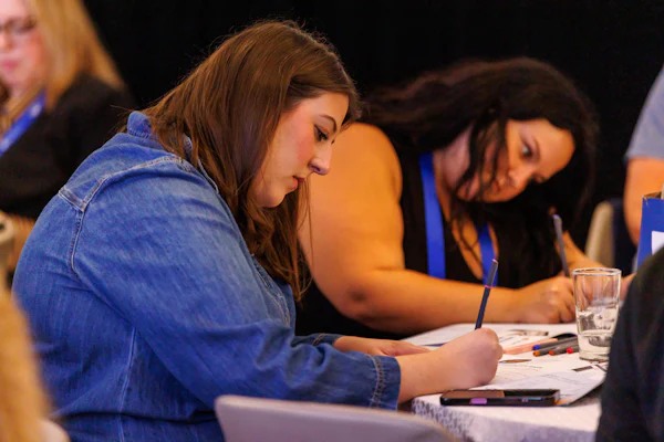 Taking notes at the Builder Marketing Summit